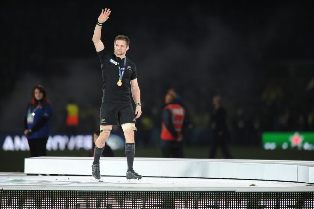 McCaw waves to the fans after receiving his winners medal following victory over Australia in the RWC Final. 